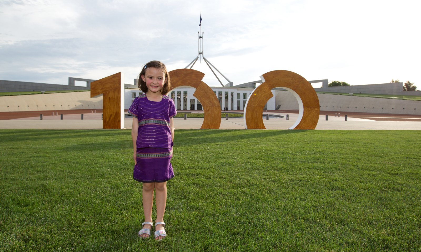 Centenary of Canberra sign outside Parliament House, Canberra. Picture by Belinda Pratten